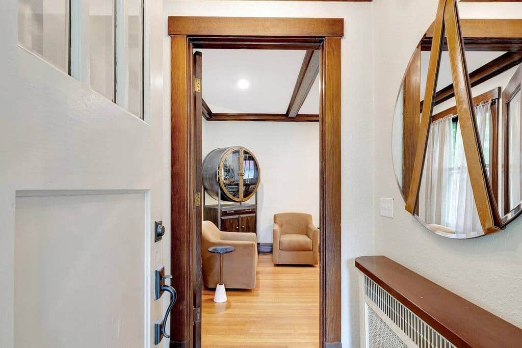 Walking into the front door to the main level living room. Walking into the front door to the main level living room.