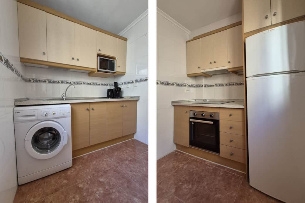 Fully equipped kitchen, complete with a washing machine.