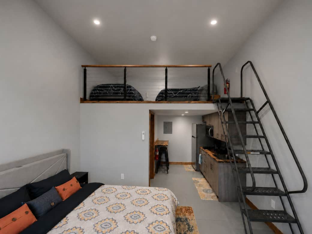 Spacious master featuring a luxury king-sized bed in the Black Hills, SD.