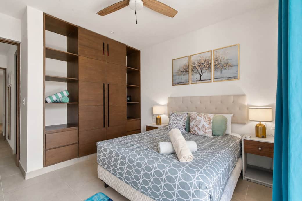 Not only does this bedroom have direct access to your private balcony, A/C, and a ceiling fan, it also features a full wardrobe, in-room safe, and beach towels for your trips to the beach.