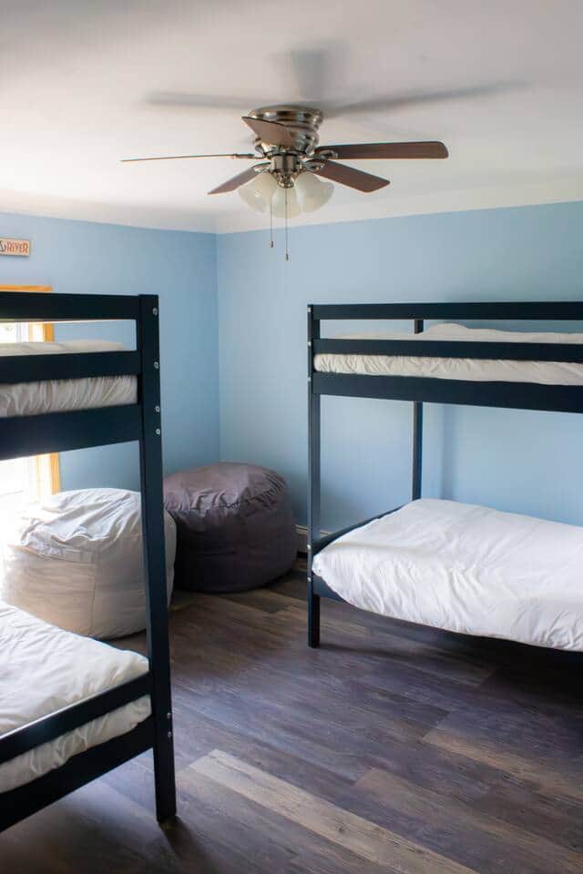 Two bunkbeds with twin sized memory foam mattresses.  Room darkening shades to prevent the light from waking the kids too early!