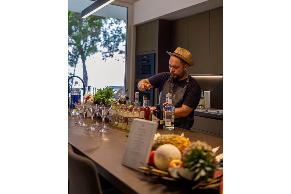 Award winning mixologist mixing cocktails at Villa Sueño.