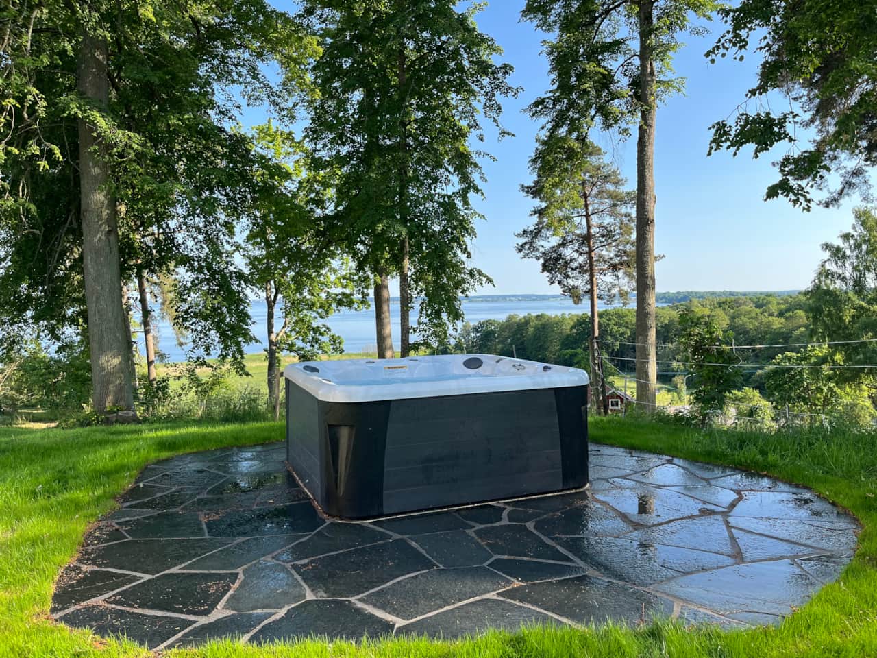 Hot tub with scenic lake view