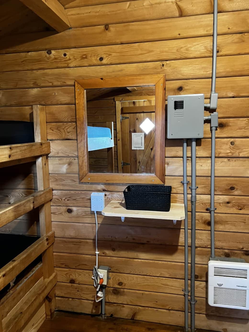Shelving and extra outlets to charge all your devices.
