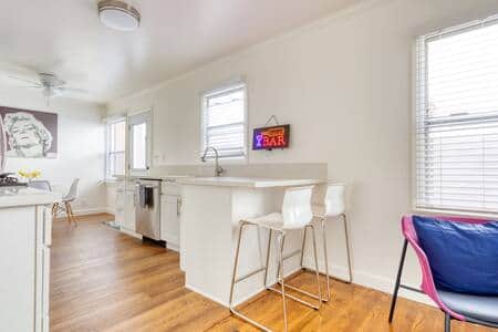 Gorgeous stone counters and easy breakfast bar. 