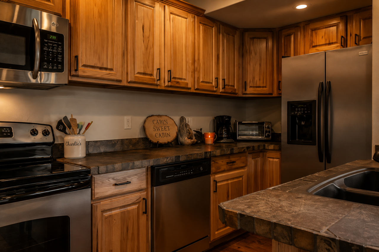 Rustic kitchen with modern amenities in forest cabin