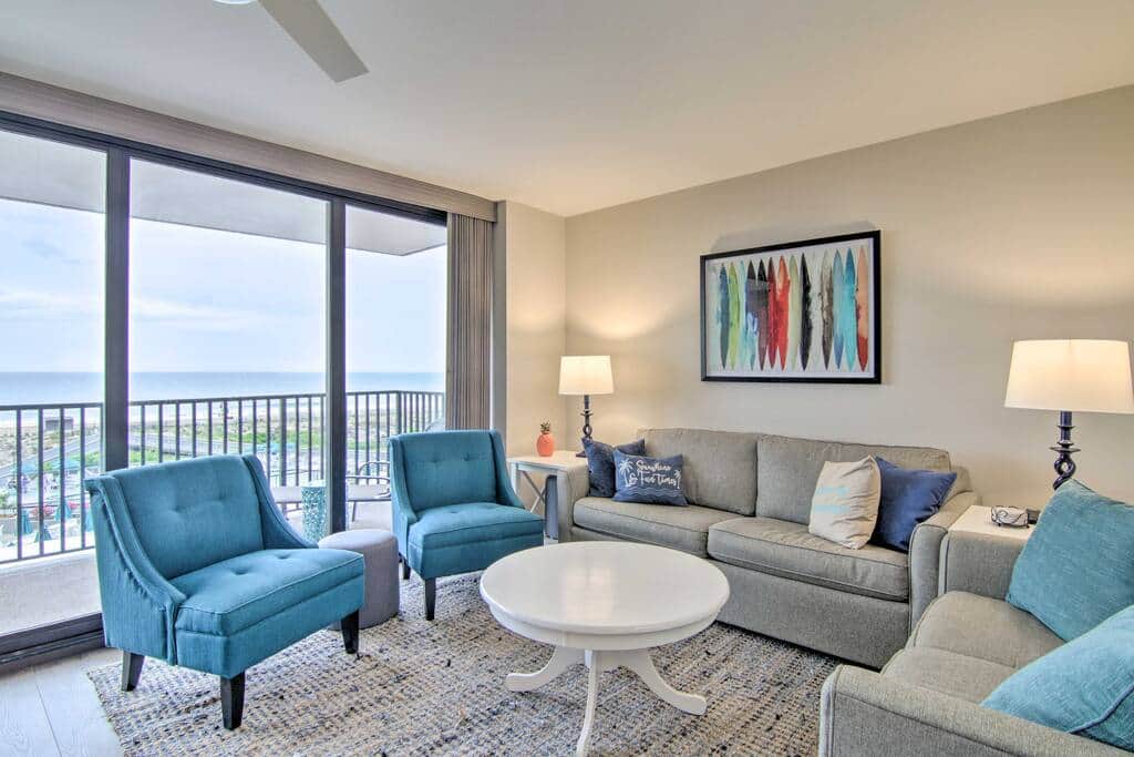 Comfortable living room layout with a beautiful ocean view.