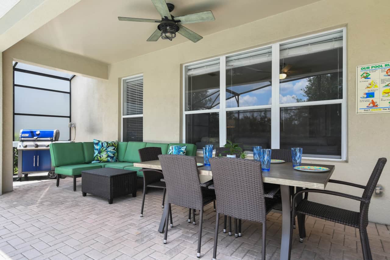 Enjoy a meal al fresco by the pool.