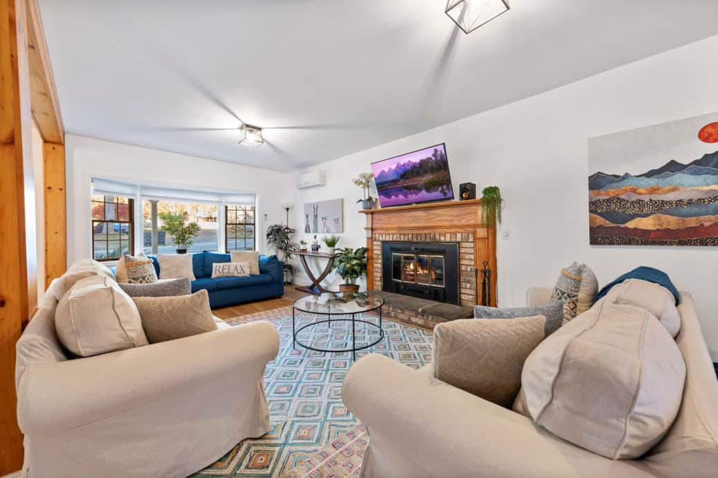 Plenty of seating around the fireplace 