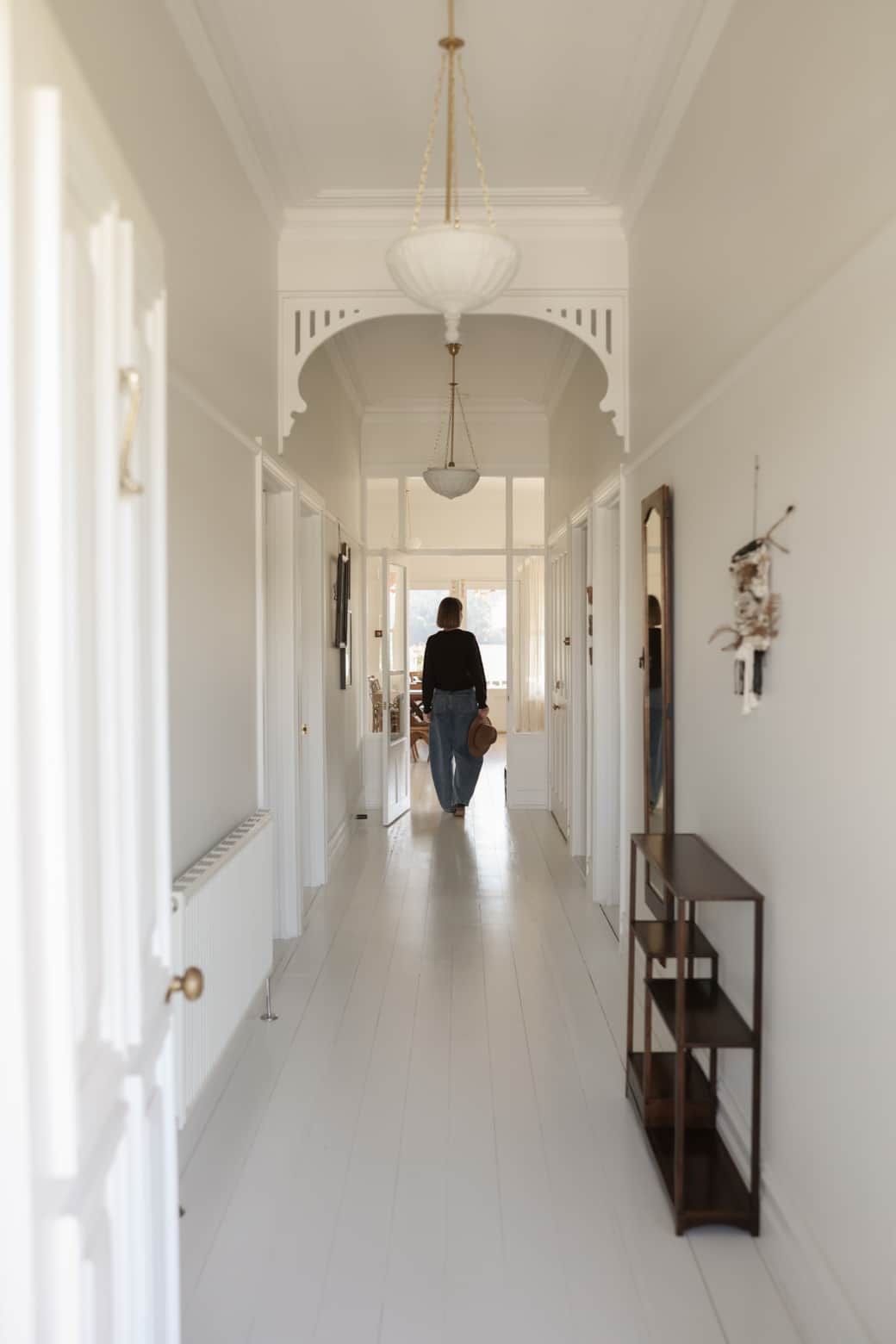 Dufflebird Farm all-white hallway, Berrys Creek VIC, pared-back interior with space to breathe Dufflebird Farm all-white hallway, Berrys Creek VIC, pared-back interior with space to breathe