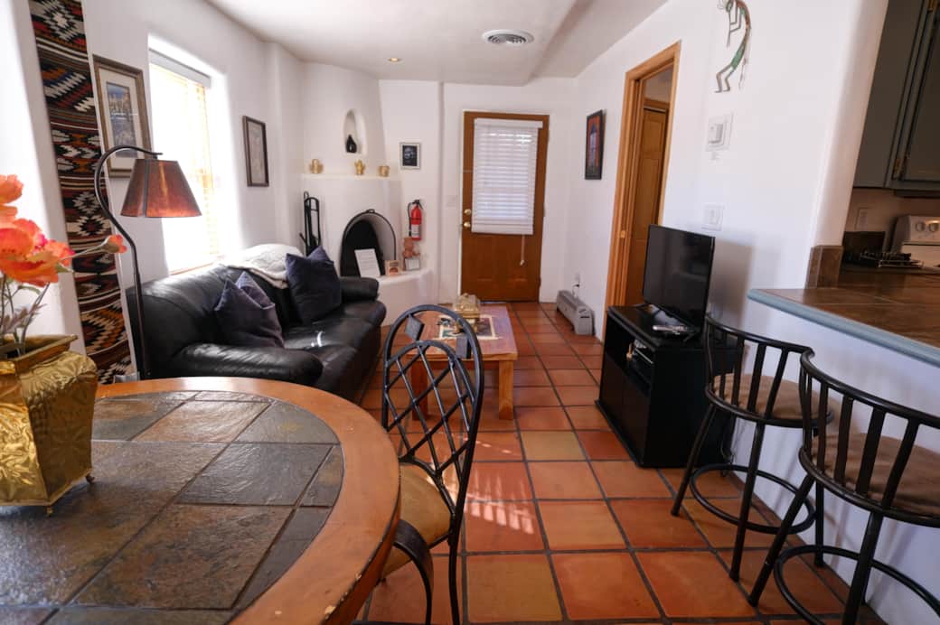 Kitchen and den spill into each other Kitchen and den spill into each other
