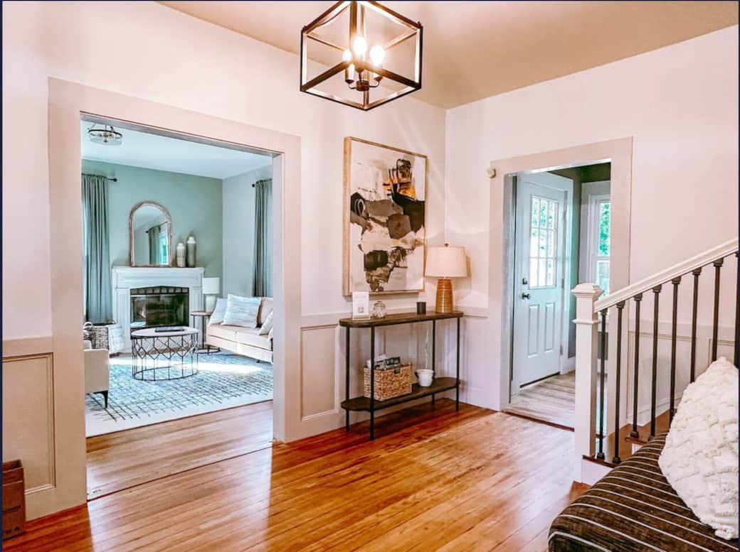 View from Foyer into Living Room, the door on the right leads to the Bathroom and Kitchen