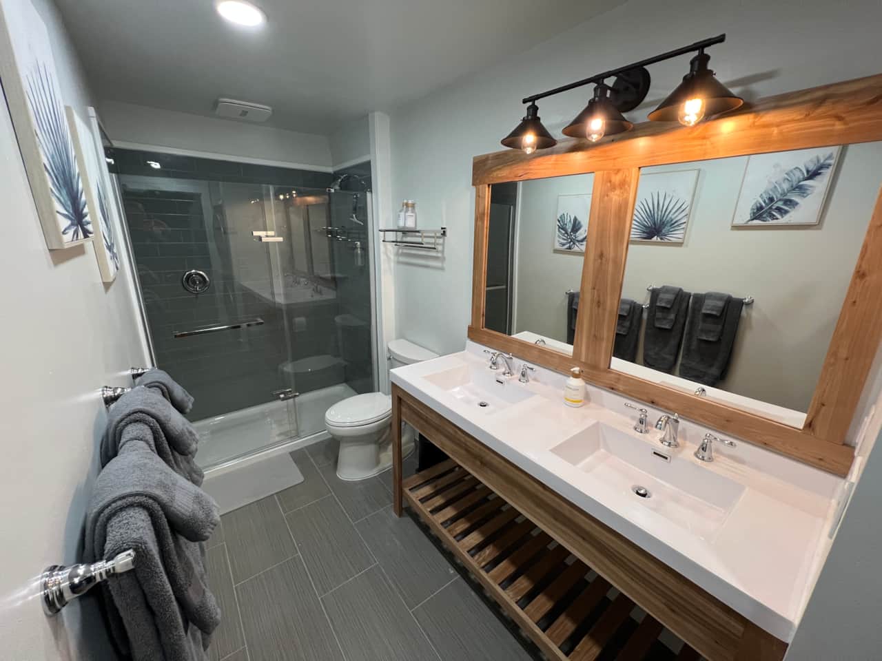 Custom double sinks vanity for a spacious morning or pre-event wash.