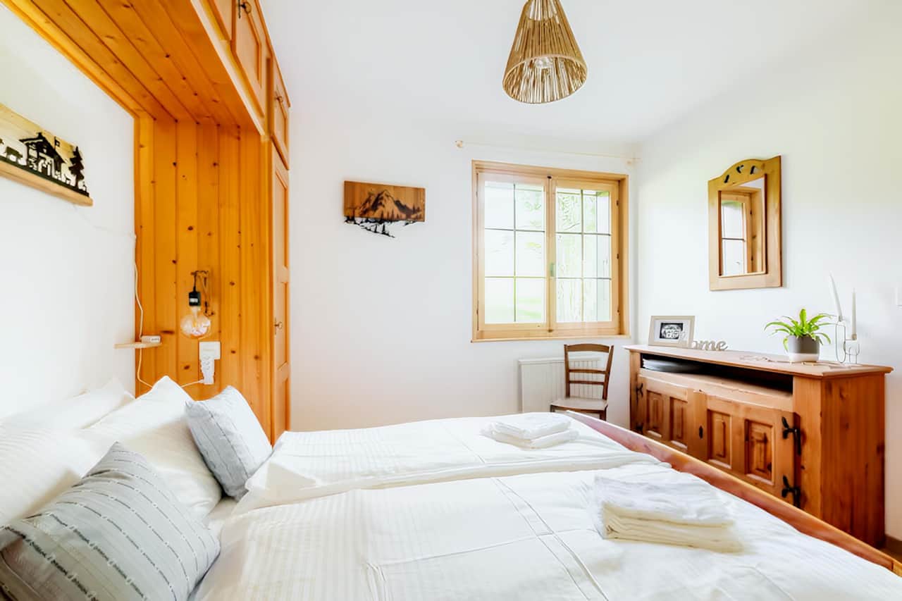 Bright bedroom with wooden furniture ✨