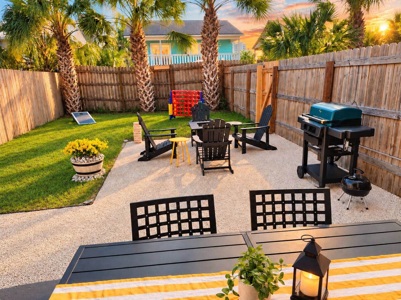 Your private, fully fenced backyard includes covered outdoor dining, a fire pit, electric and charcoal grills, cornhole, and giant four-in-a-row. Gather beneath the palms for BBQ dinners and family games. Pets are welcome to join your stay