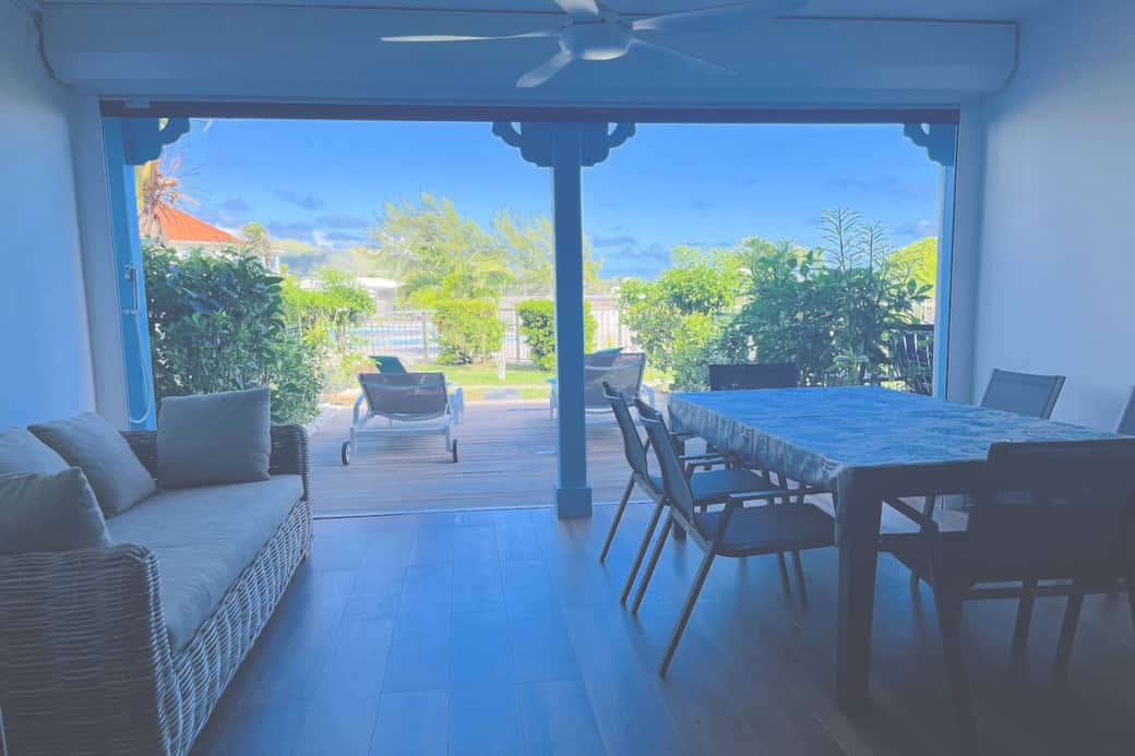 Terrace with access to the garden and pool Maison Caraïbes