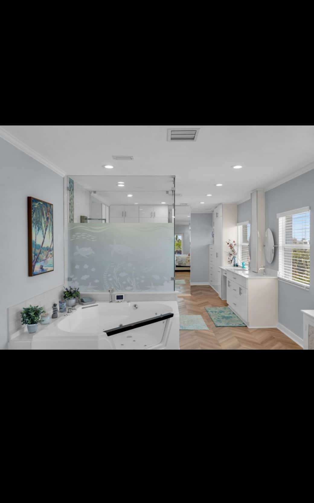 Master bath with soaking tub, shower and abundant closet space Master bath with soaking tub, shower and abundant closet space
