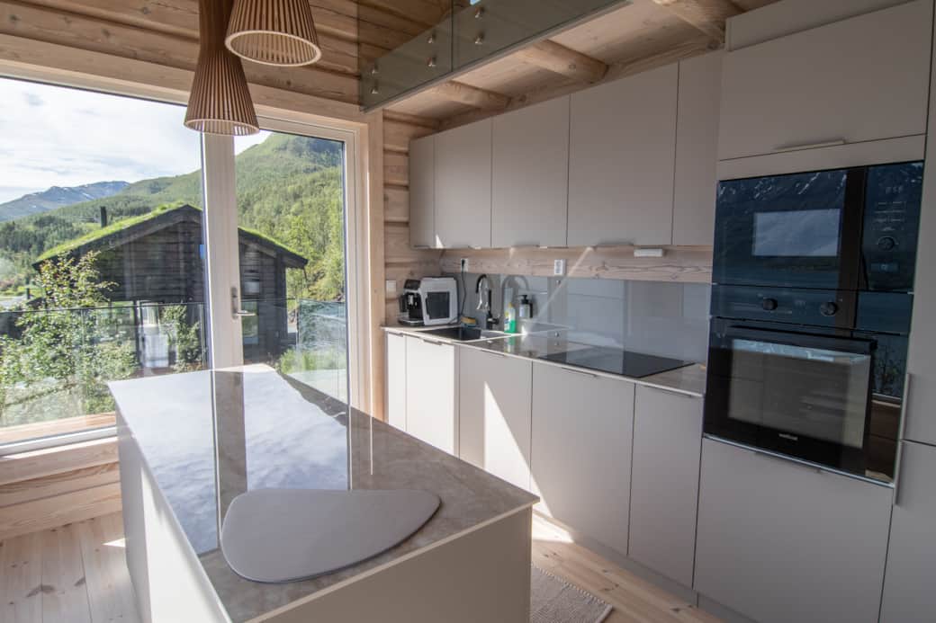 Nordlys modern kitchen with Arctic landscape view, Ulsfjord Norway Nordlys modern kitchen with Arctic landscape view, Ulsfjord Norway