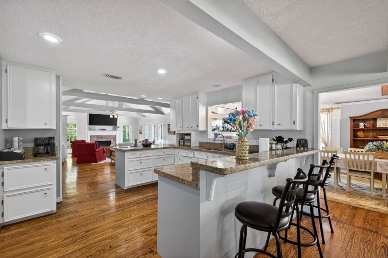 Schulenburg Ranch Retreat-an open plan design connecting kitchen with living areas