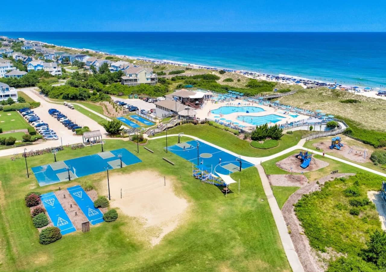 Beach front resort with multiple pools. Waiter/Waitress service on the beach. Drink special each day