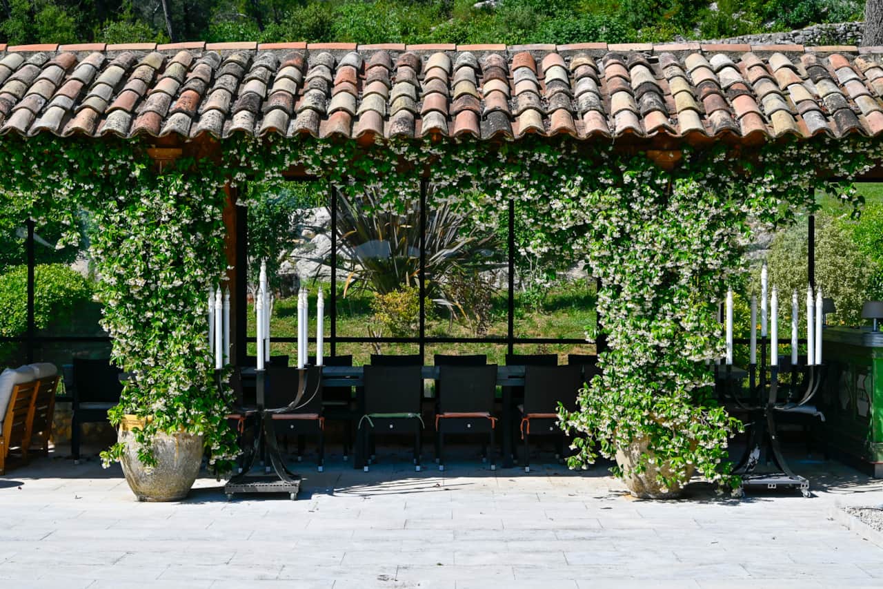 Shaded terrace beside the pool for outdoor gatherings