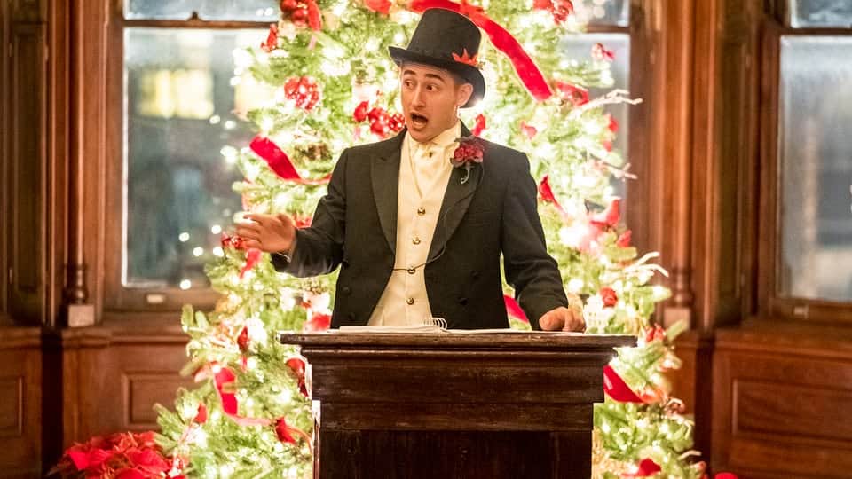 Speaker giving a talk during Dickens on the Strand festivities in Galveston