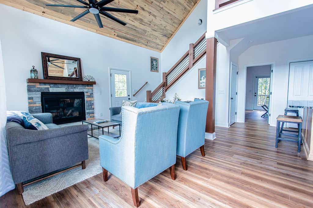 Sit around the fireplace and relax with the big view out the front windows.