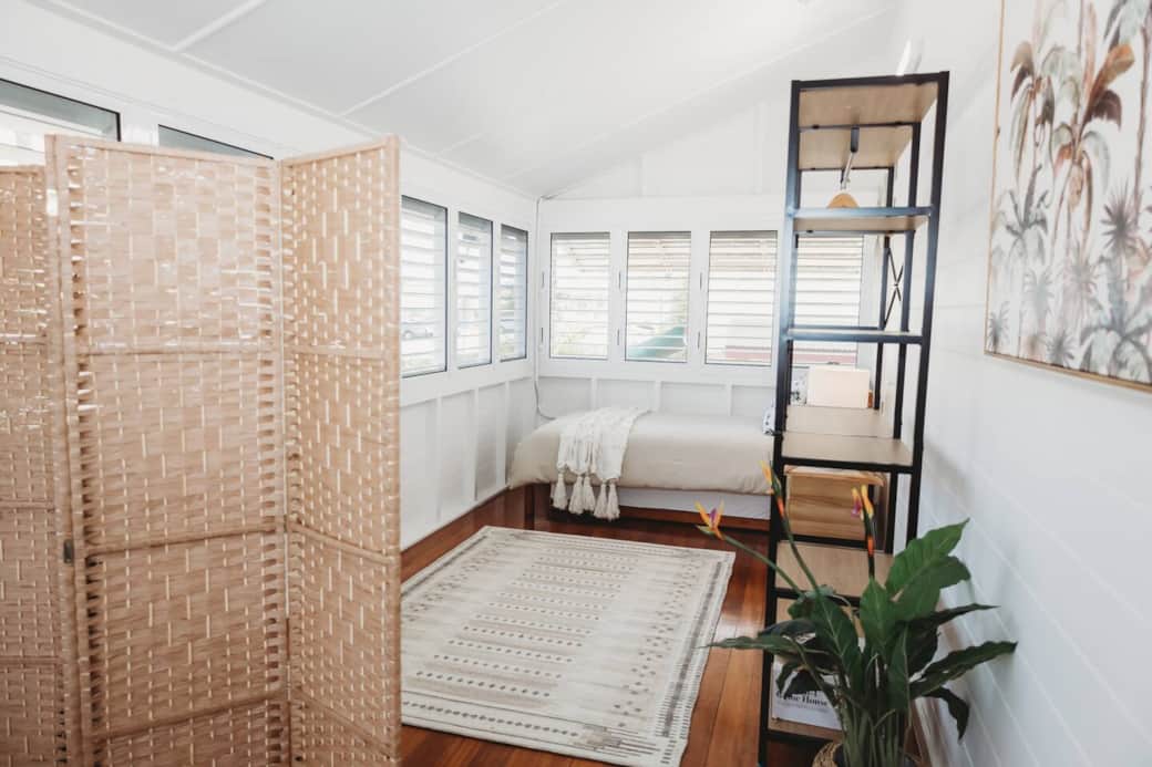 A charming enclosed sleep-out bedroom with comfortable space for 2 king single beds. A charming enclosed sleep-out bedroom with comfortable space for 2 king single beds.