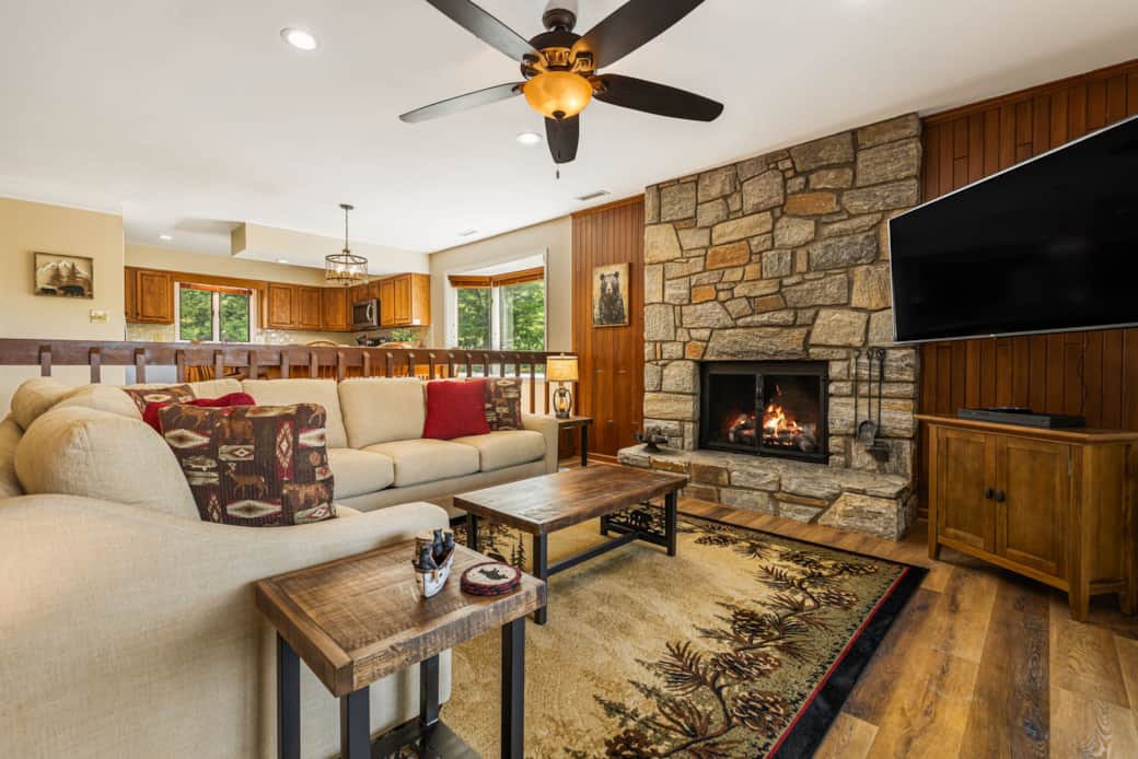 Living room with new gas fireplace, new sectional couch and coffee table, Smart TV and views of Chet Living room with new gas fireplace, new sectional couch and coffee table, Smart TV and views of Chet
