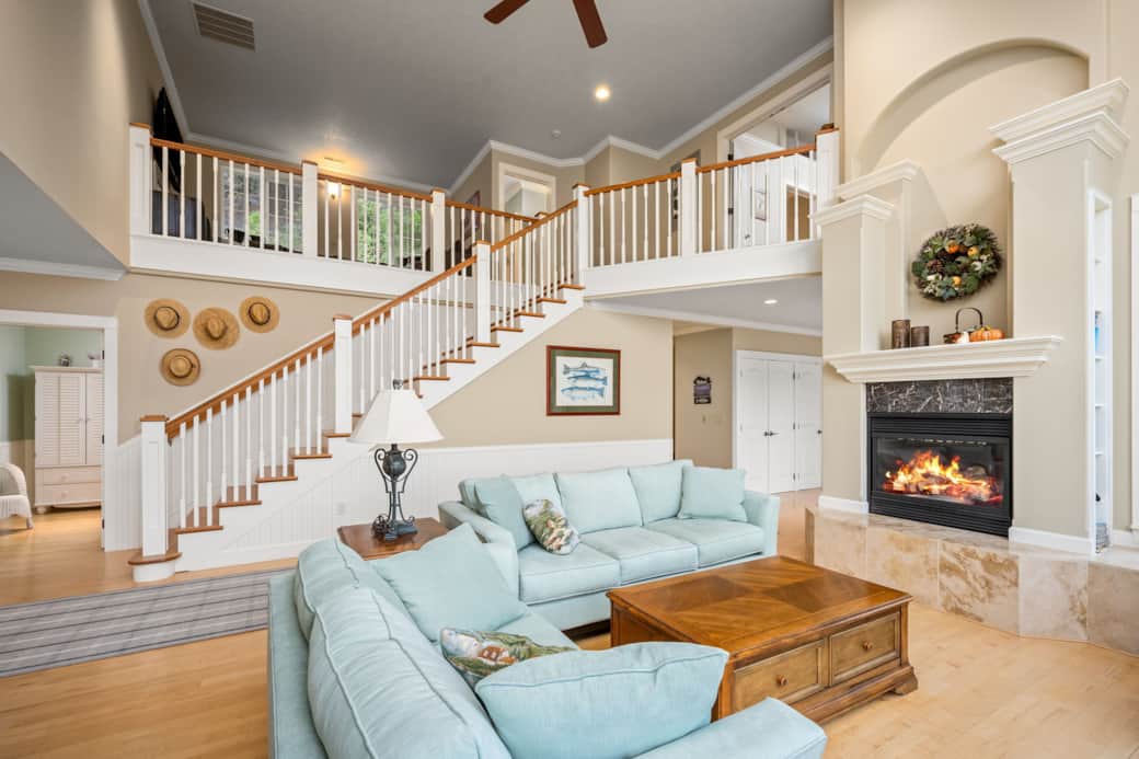 Living room with above tv landing on second floor