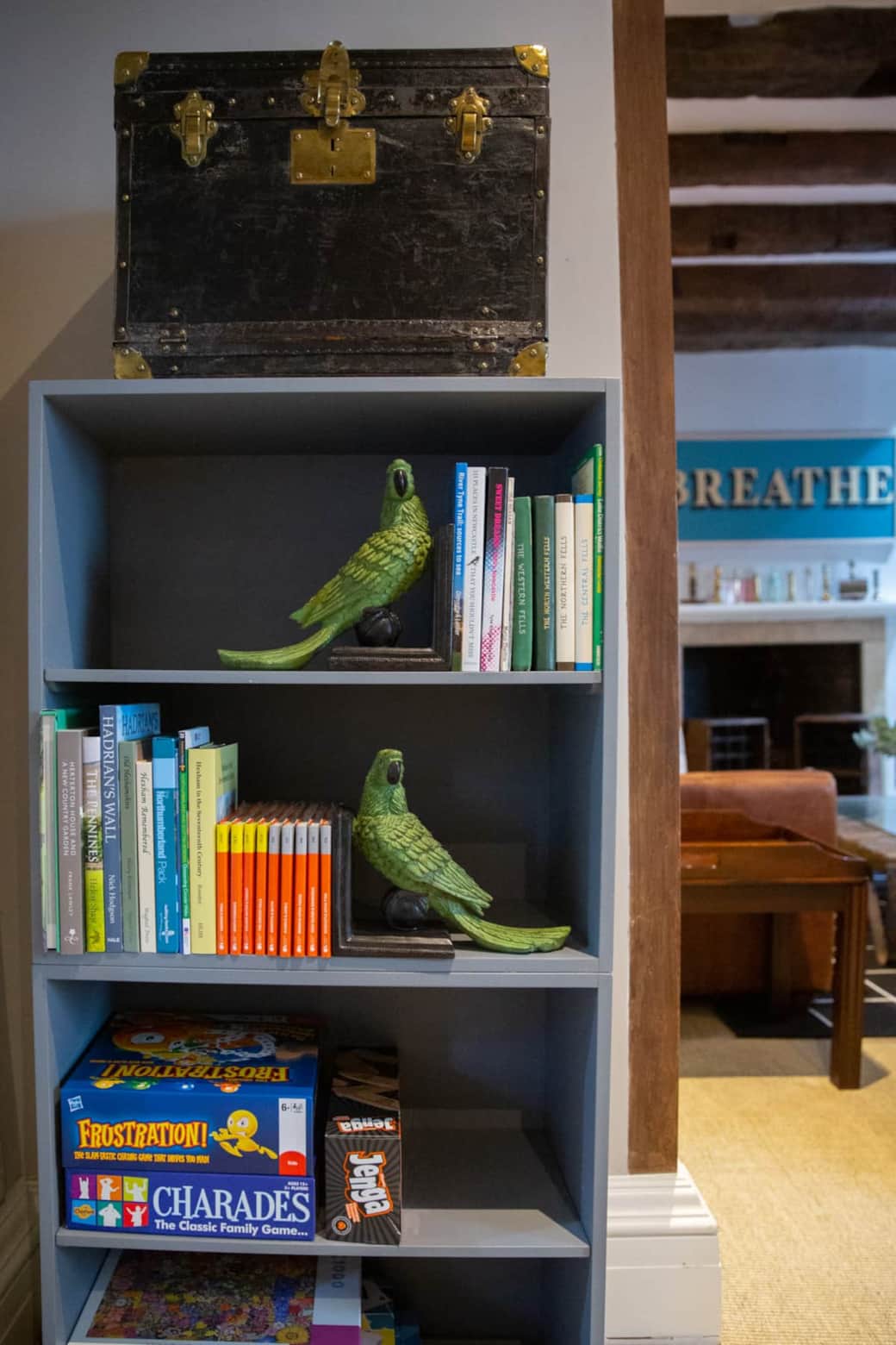 Well stocked with maps, local books and games - Sharon Harrison Photography 