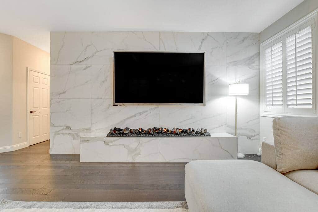 85In TV, Granite wall with Electric Fireplace