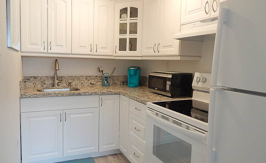 Unit # Renovated kitchen, equipped with all the essentials to complete a full meal.