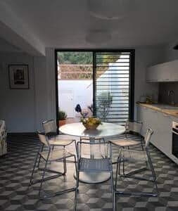 The kitchen looking from the entrance to the internal courtyard and pool