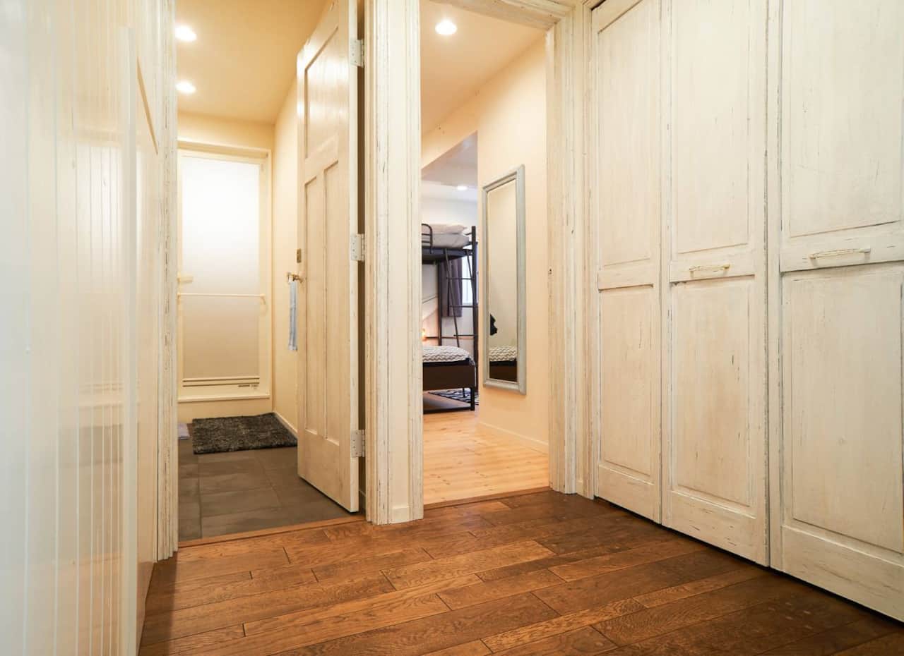 Easy access to bedrooms and bathroom from this spacious, light-filled hallway designed for families