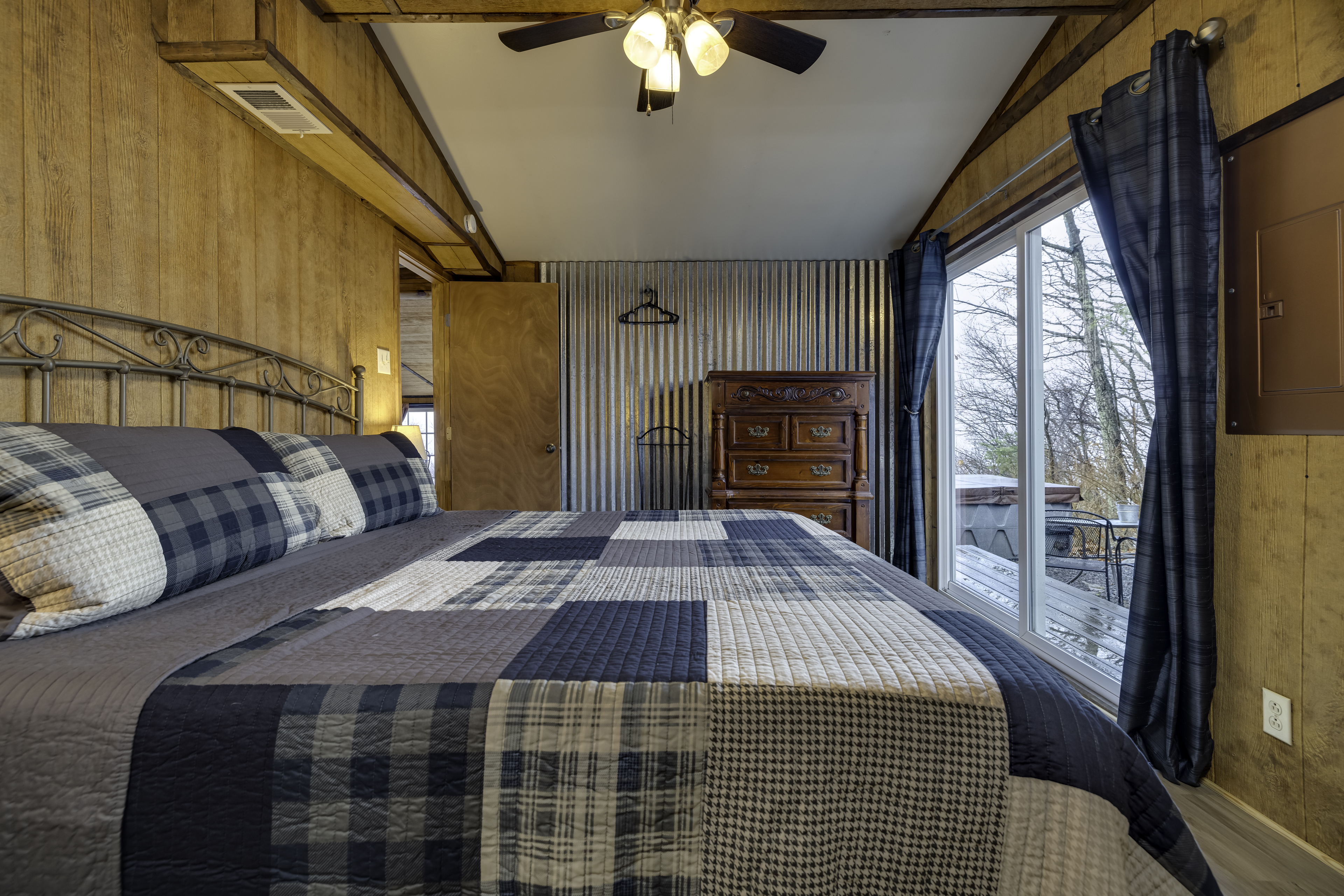 Bedroom 2 opens to the hot tub area