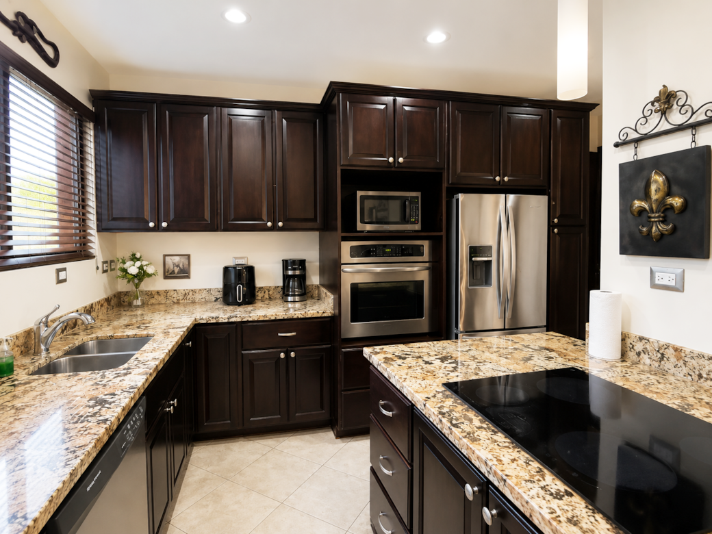Fully equipped kitchen with microwave, refrigerator, air fryer | Monaco Condominiums Jaco Beach Fully equipped kitchen with microwave, refrigerator, air fryer | Monaco Condominiums Jaco Beach