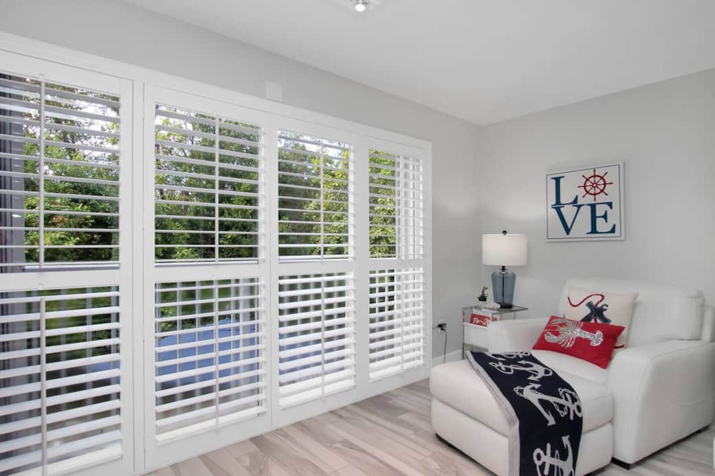 Reading and relaxing area off the Great Room with a view of the Mangrove out side.