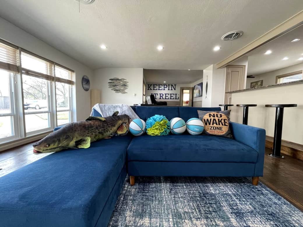 Futon couch in game room 