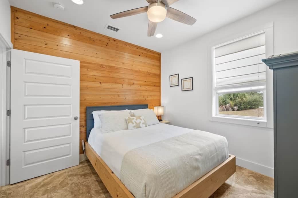 1st Floor Queen Bedroom w/ Armoire & Smart TV  (close Media Room door to create 2nd Primary Suite!)