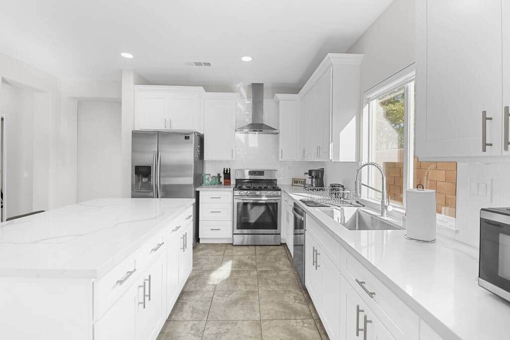 Open Full Kitchen Layout with a Gorgeous Island. Ask about all our Kitchen Utensils!