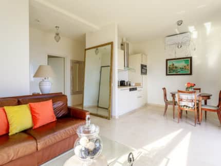 Sitting area with leather sofa, Apartment Three