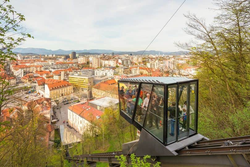 The Ljubljana Castle funicular ascending the steep forested hill