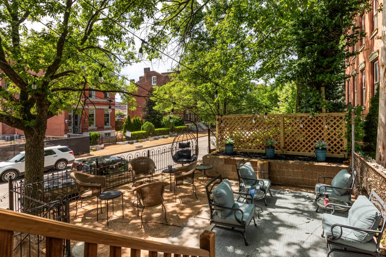 Step out the back door into your private retreat with fire pit. Be sure to try out the egg chair!