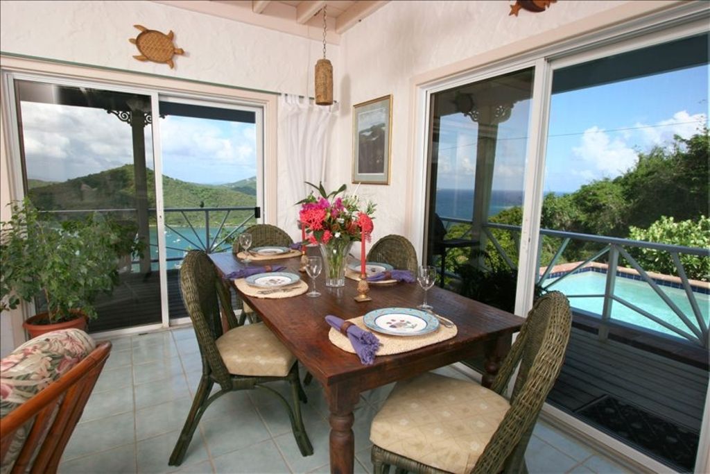 Dining area with pool steps away