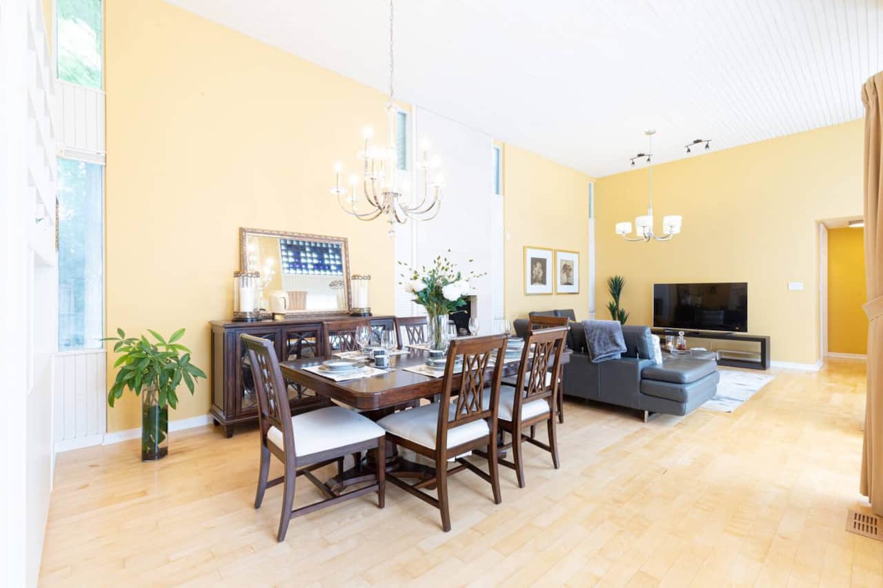 Dining area with 14 feet high ceilings