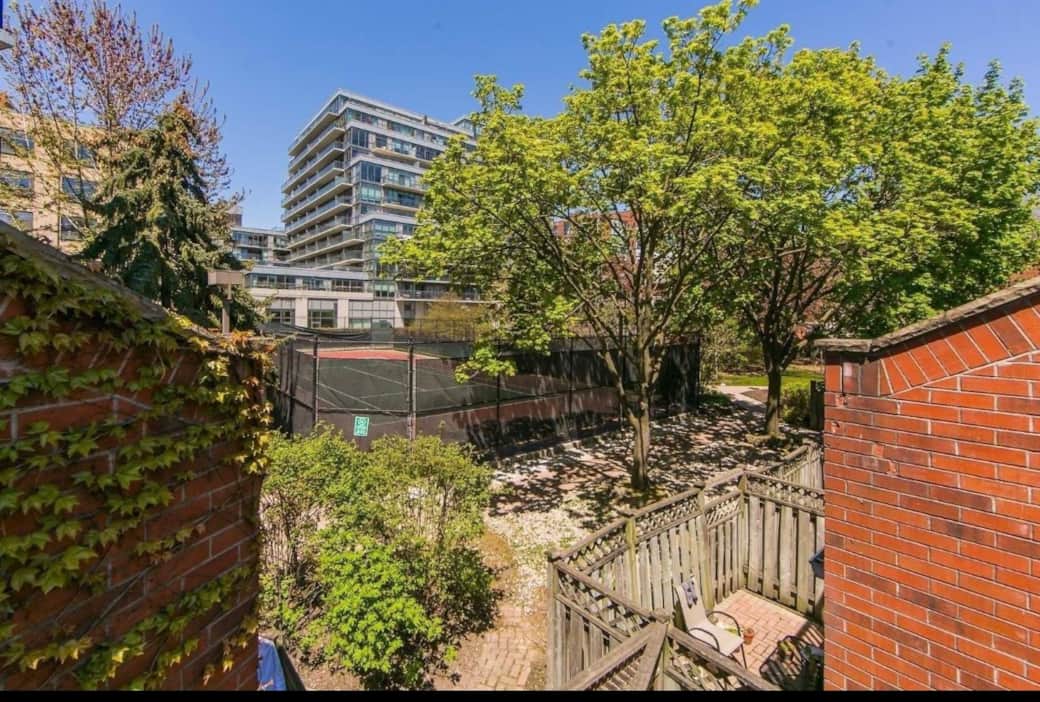 View of gardens and tennis court from the balcony