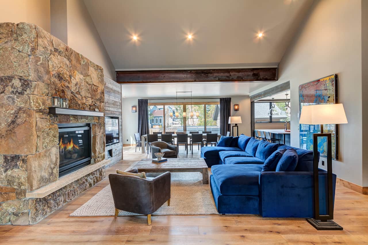 Open plan living and dining room with west facing mountain views