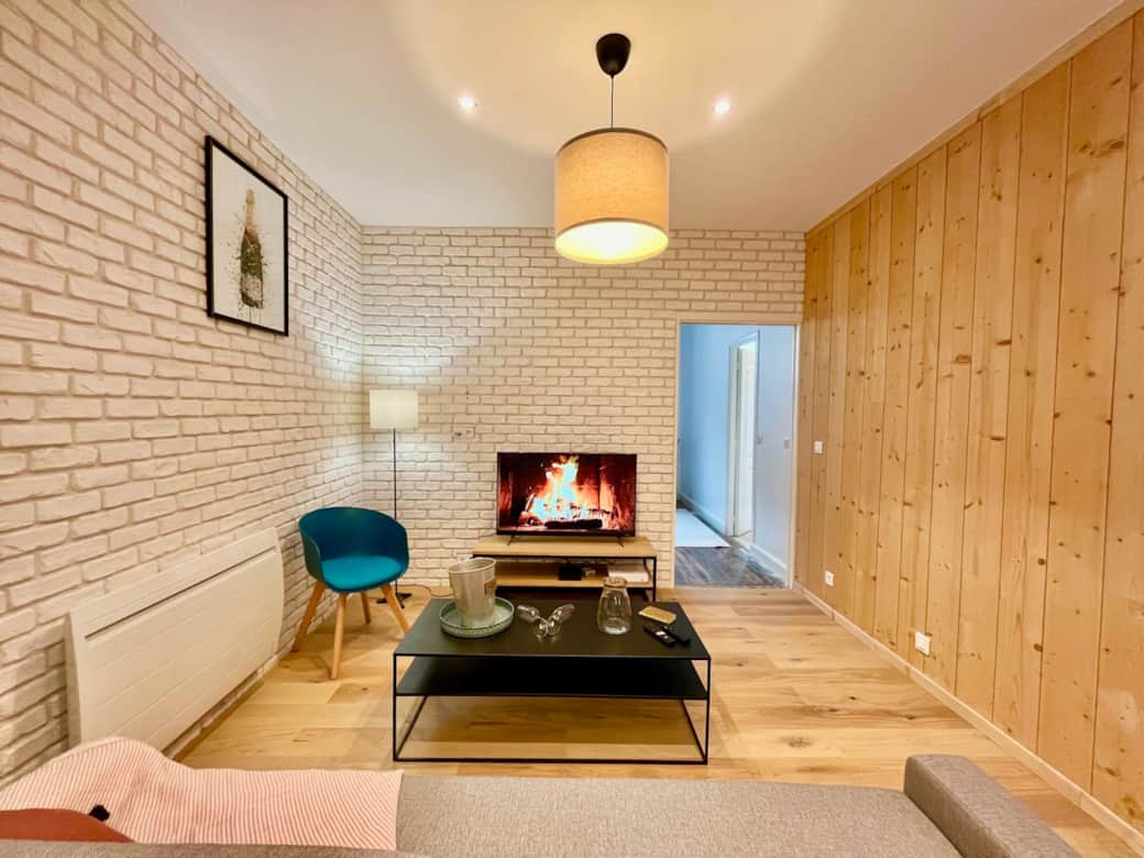 Le salon de l'appartement Arthys Logement à Reims par La Conciergerie Des Sacres