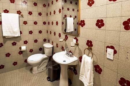 Bathroom 3: Spacious private bathroom with a relaxing tub and all essential toiletries.